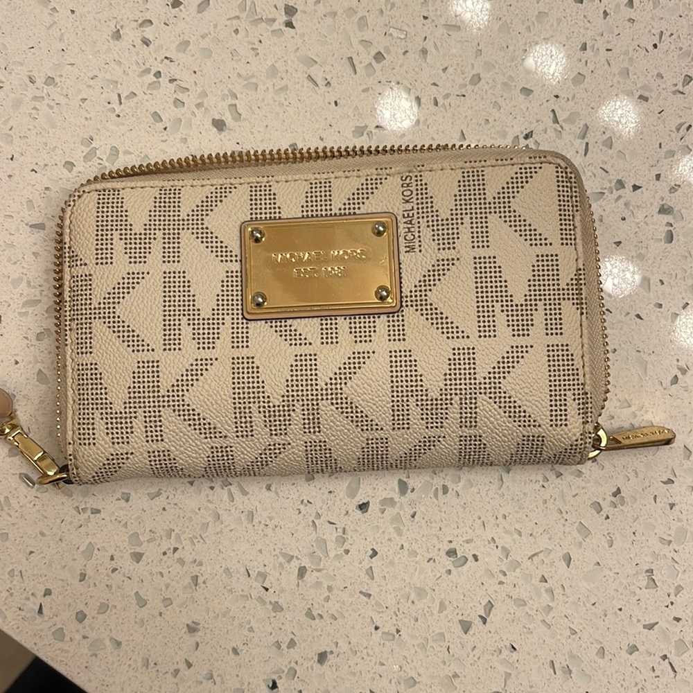 Woman’s Michael Kors wallet